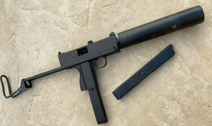 a mac 11 with a mock suppressor